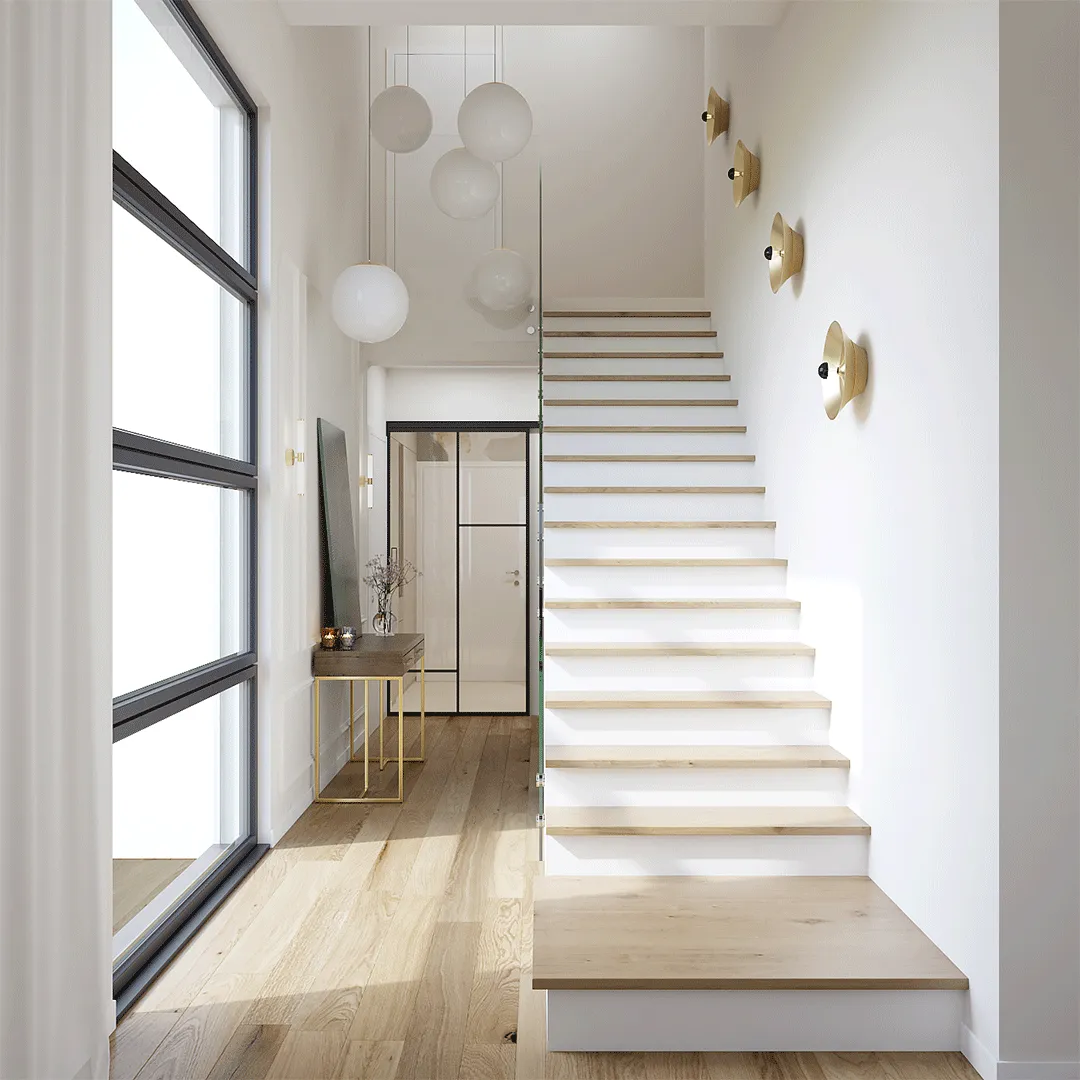 Prikaz stepeništa s zlatnim lampama na zidu